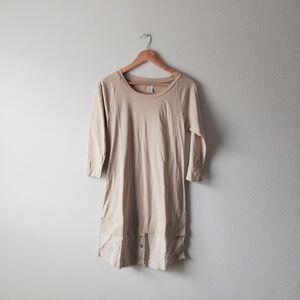 Classic Beige Mini Dress with Button Hem